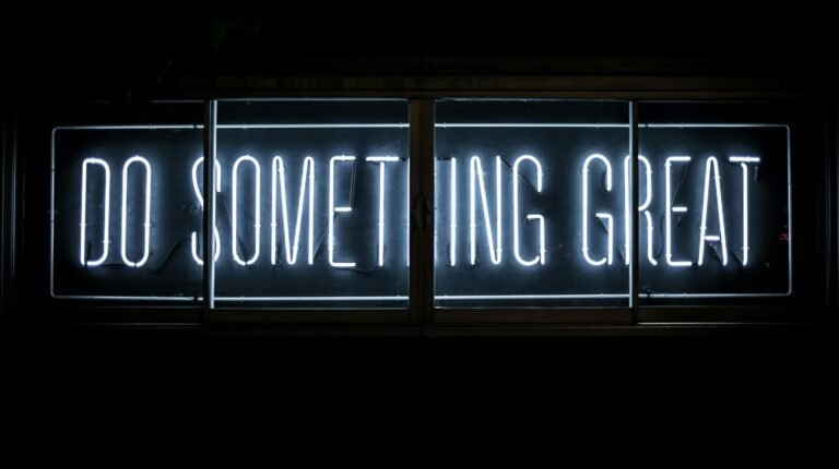 Motivational digital signage representing strong user experience and purposeful professional website design. Photo by Clark Tibbs