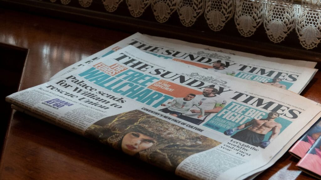 Image of above the fold on a newspaper highlighting homepage mistakes people often make. Photo by The Blowup. 