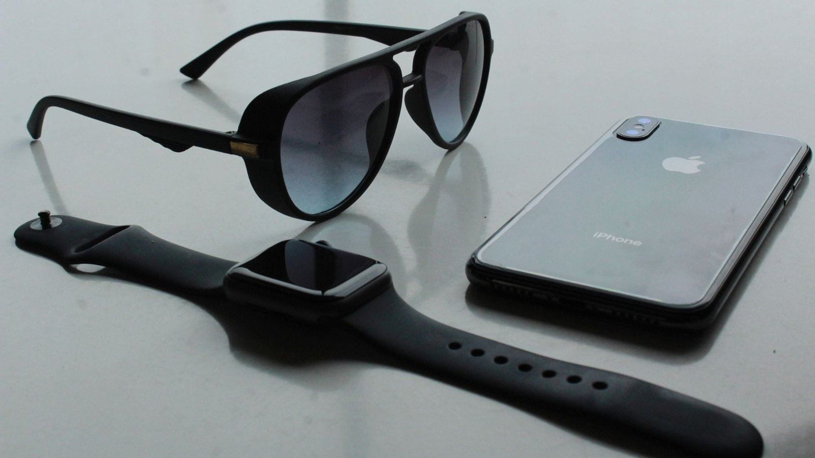Sleek smart glasses displayed alongside modern wearable technology representing the future of websites and augmented reality. Photo by Tanmay Tikekar.